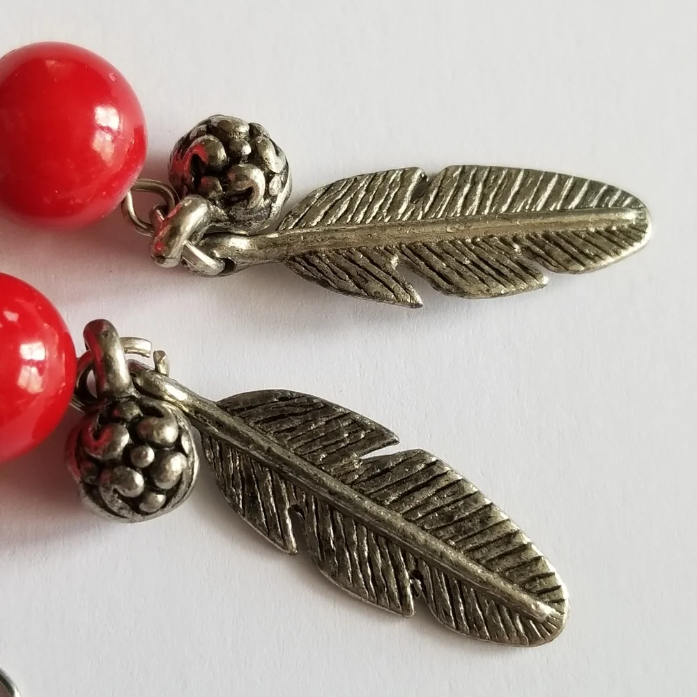 Feather earrings with red beads and flower ball beads silver tone boho